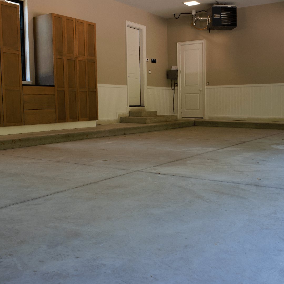 Bare concrete garage slab before coating