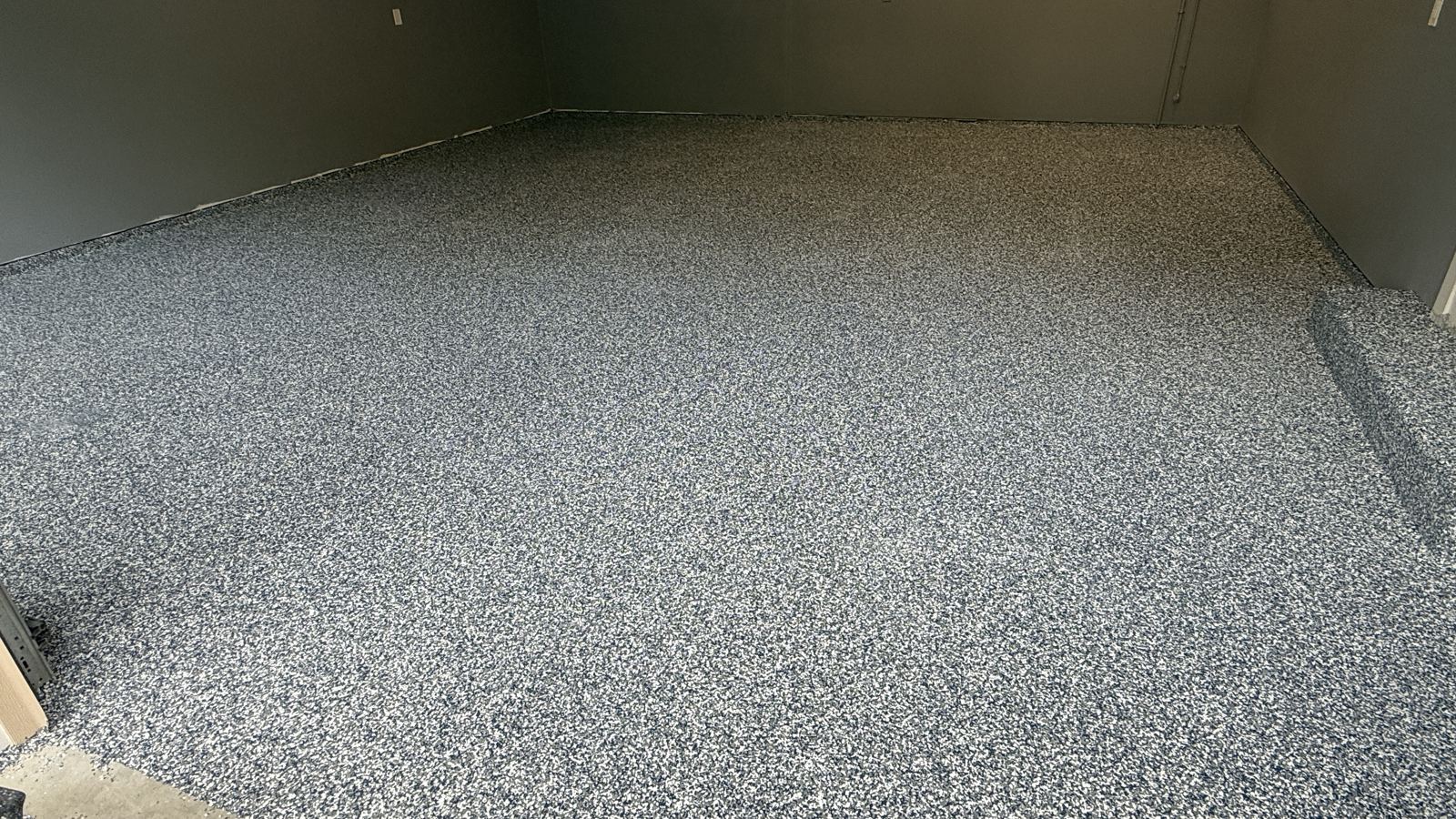 Navy flake garage floor coating with gloss topcoat